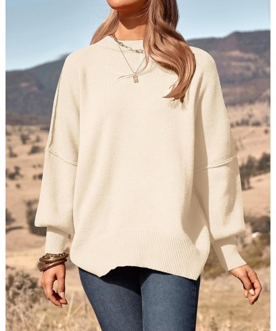 Women's Oversized Sweater 2024 Casual Fall Crewneck Long Sleeve Loose Side Slit Ribbed Knit Pullover Tops Solid White $27.43 ...